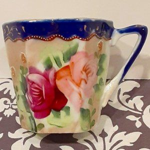 Hand Painted White Teacup with Floral Design   A8